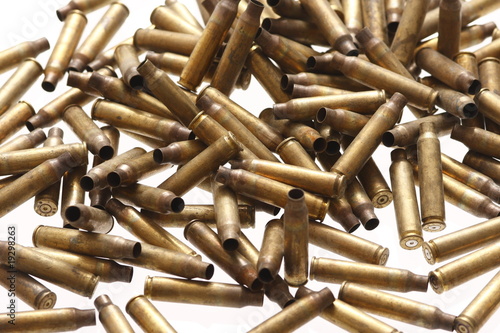Fotografi Pile of spent bullet casings.