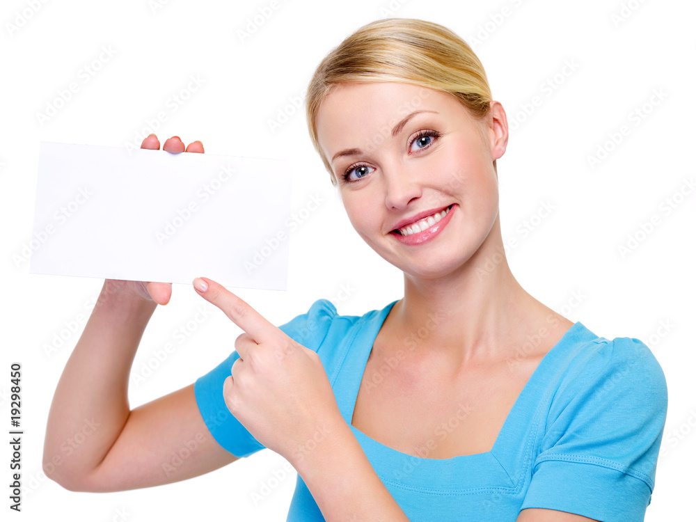 BLond woman pointing on the blank white card BLond woman pointing on the blank white card