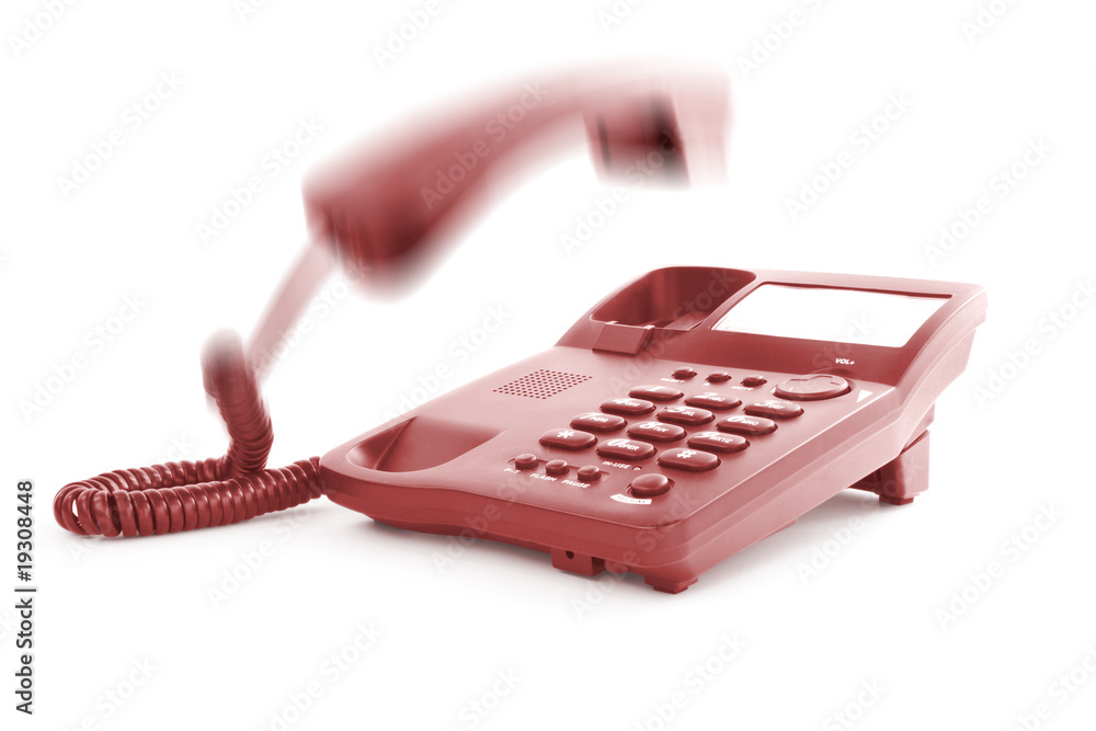 red office phone with the handset in motion red office phone with the handset in motion