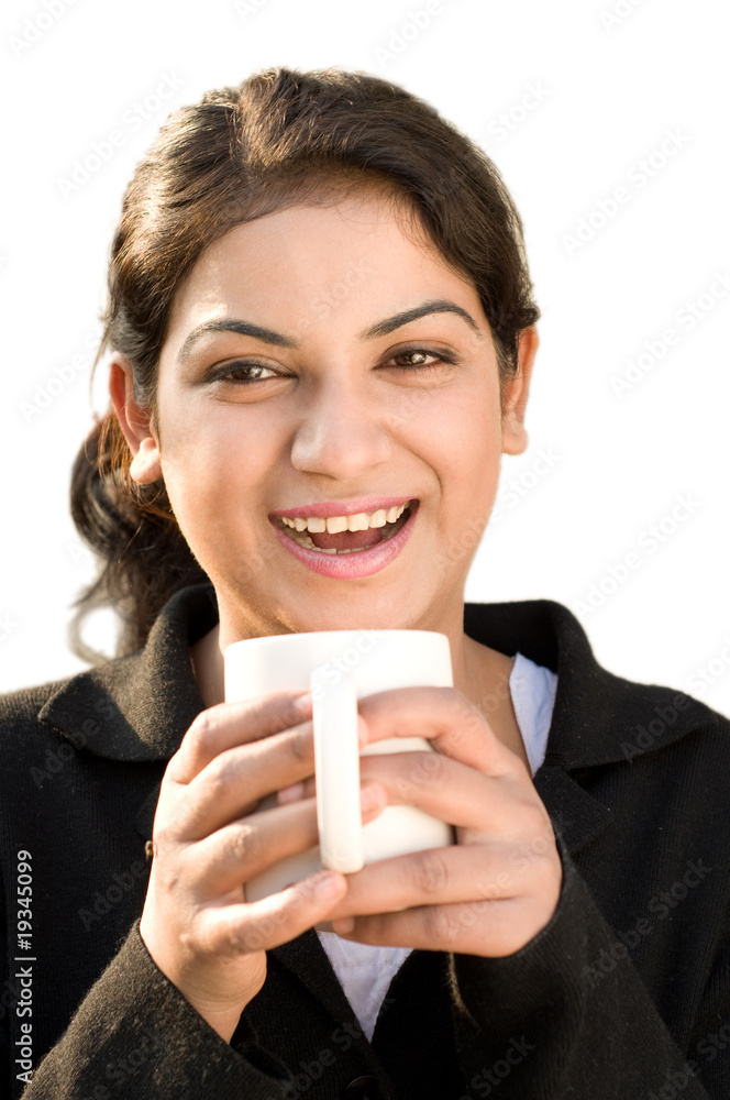 Cheerful business woman holding coffee cup Cheerful business woman holding coffee cup