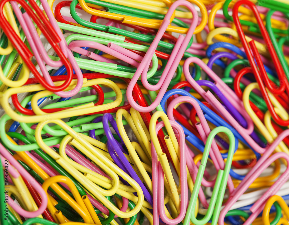 multicolored staples background multicolored staples background
