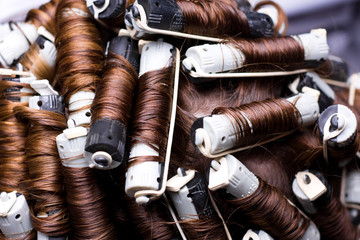 Handdoek met foto Kapsalon Roze haarrollers voor volumineus kapsel  © Alex Rozhenyuk