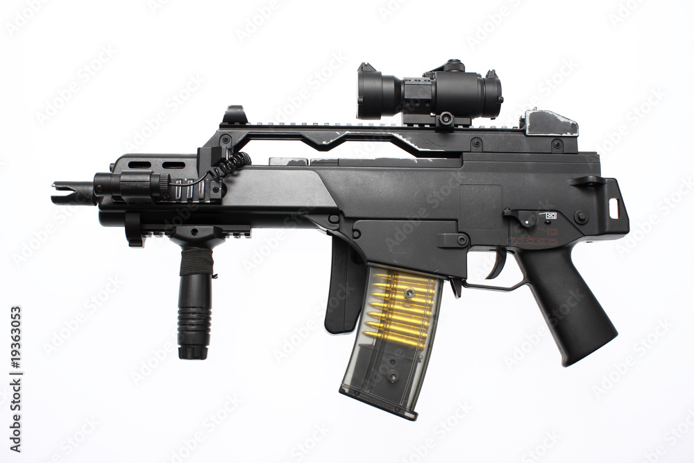 An assault rifle with a folding stock An assault rifle with a folding stock