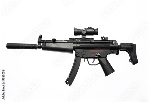 An assault gun with scope and flash suppressor photo