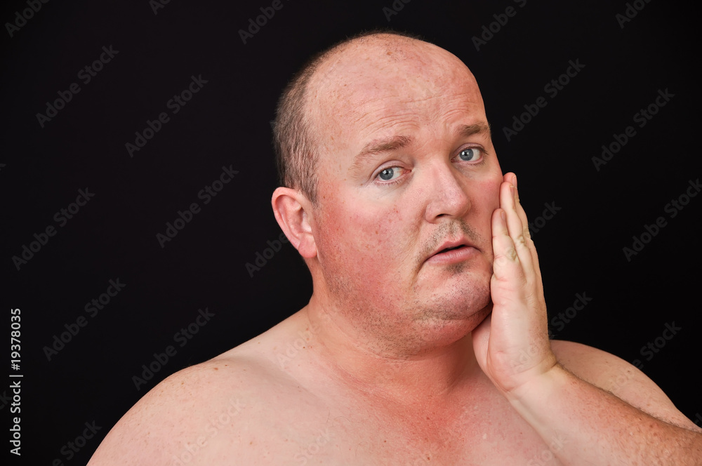 Obraz premium male in his 30's overweight on black background