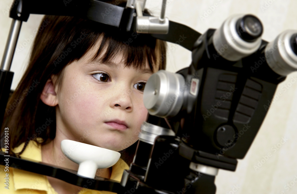 Fototapeta premium Girl getting vision tested