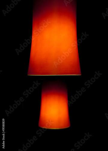 Two red interior lamps in the dark