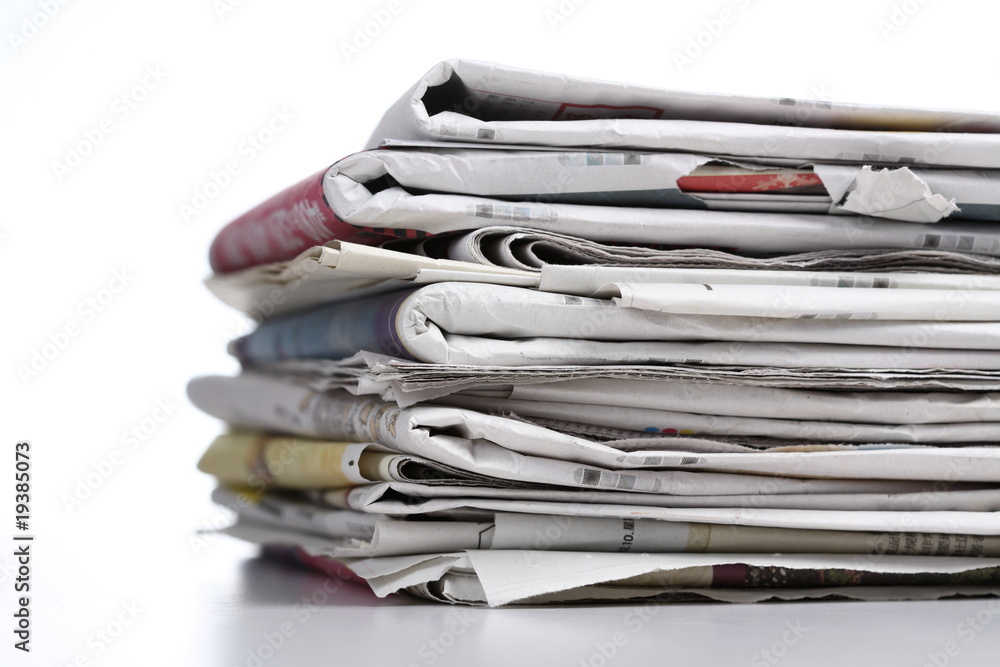 pile of newspaper with white background pile of newspaper with white background