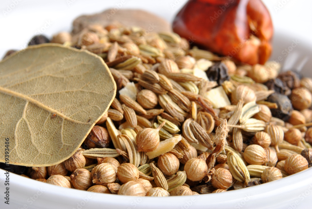 Obraz premium indian spice mix in a white bowl