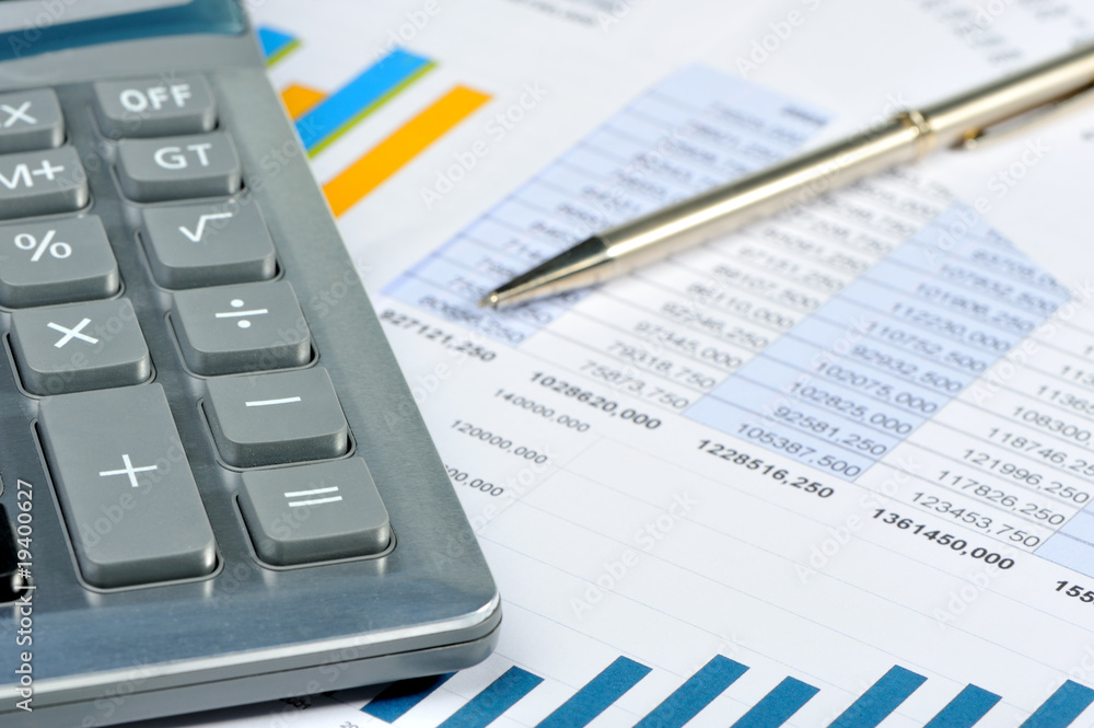 The calculator and the financial report The calculator and the financial report