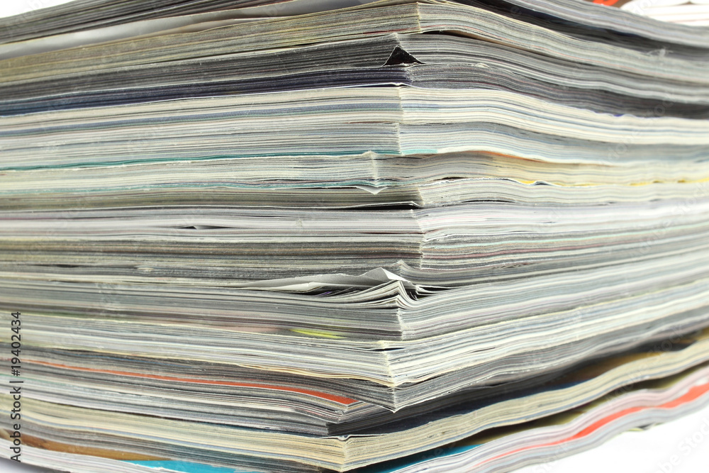 Corner of stack of old magazines for recycling Corner of stack of old magazines for recycling