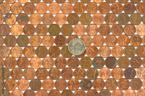 Fotografie Rows of old pennies with dollar coin