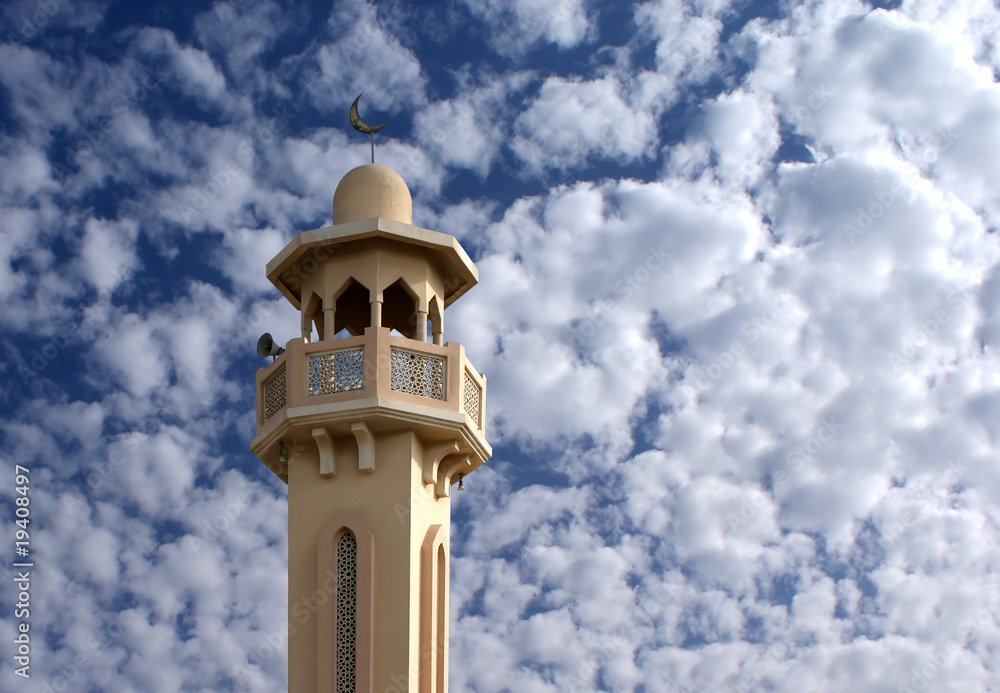 A minaret in fluffy sky