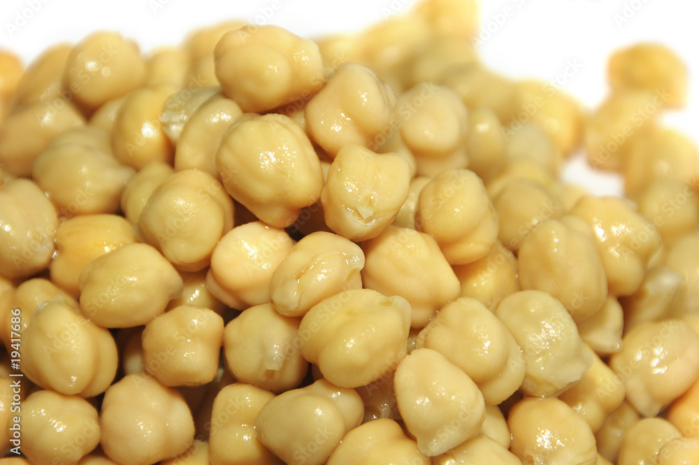 a handful of chickpeas on a white bacground a handful of chickpeas on a white bacground