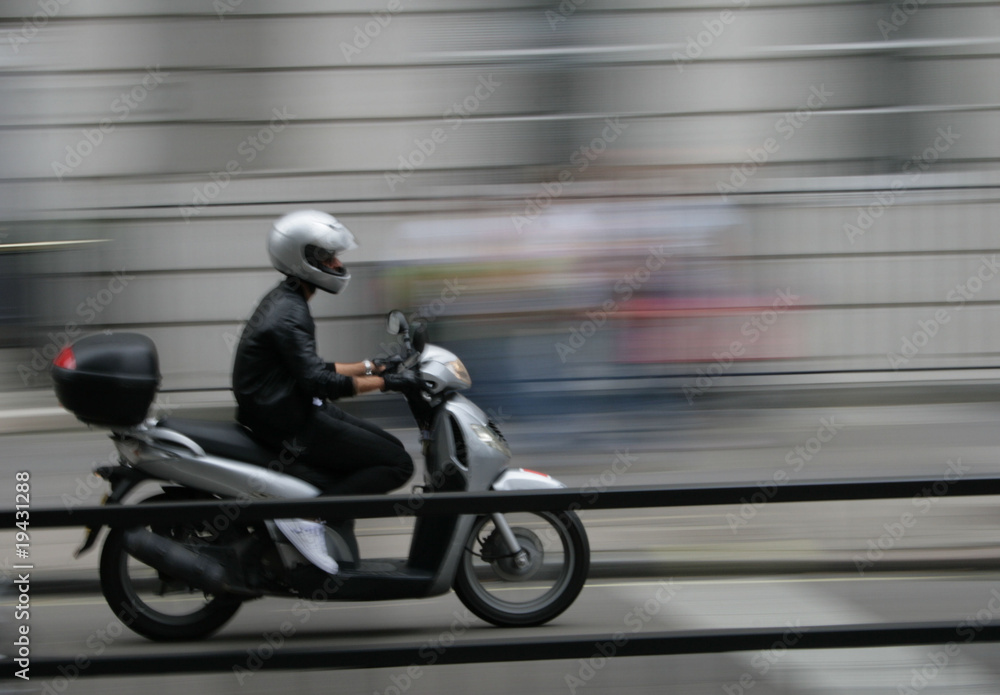 Fototapeta premium Man on a Moped