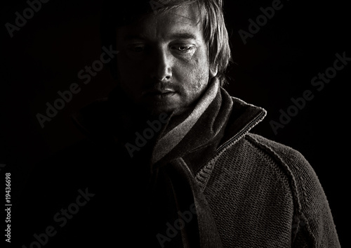 Low Key Shot of a Depressed Male © JPRFphotos