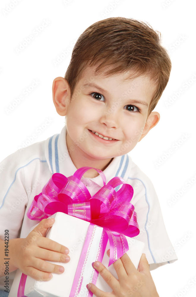 The little boy with a gift in a hands The little boy with a gift in a hands