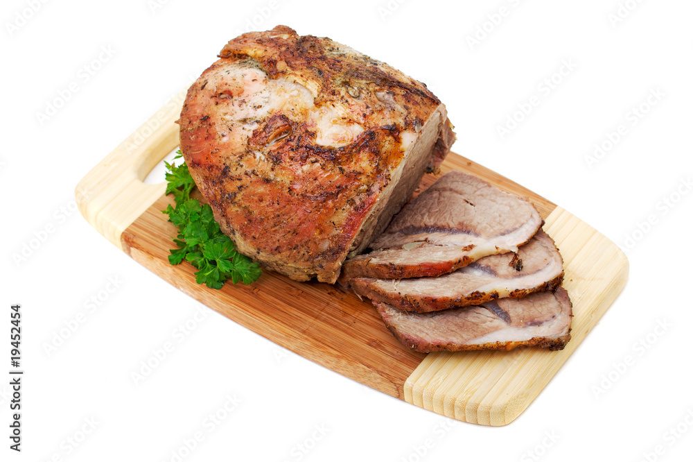 roast in the spices on a cutting board isolated on white