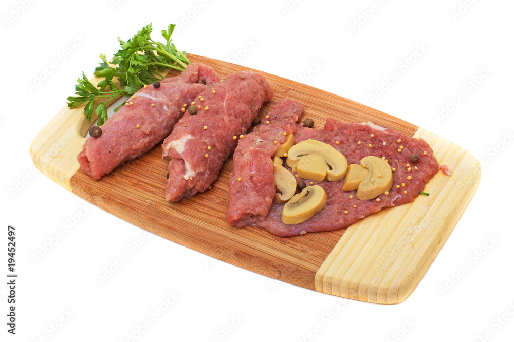hunks of meat with spices isolated on white hunks of meat with spices isolated on white