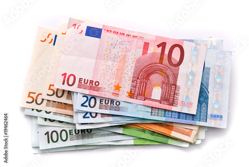 Euro banknotes isolated on a white with soft shadows