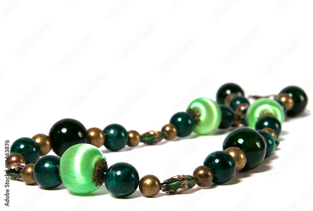 green beads isolated on white background green beads isolated on white background