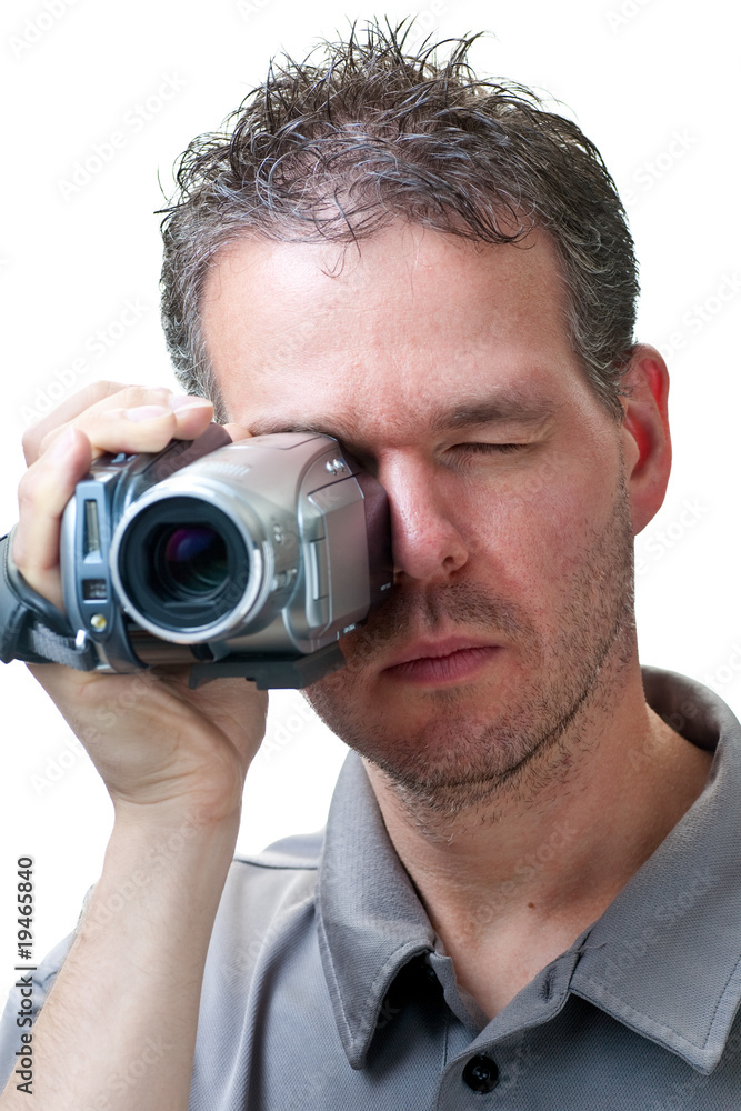 Man shooting with a video camera Man shooting with a video camera