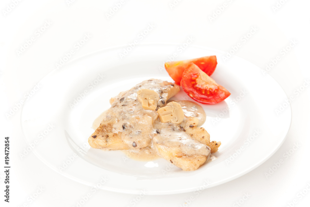 hake fillets with cheese sauce and mushrooms isolated