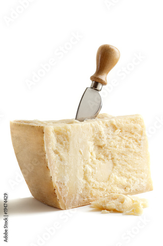 formaggio grana con coltello photo