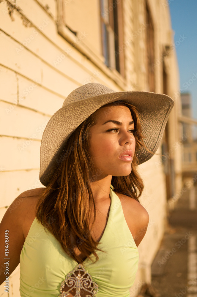 Beautiful MultiRacial model with hat