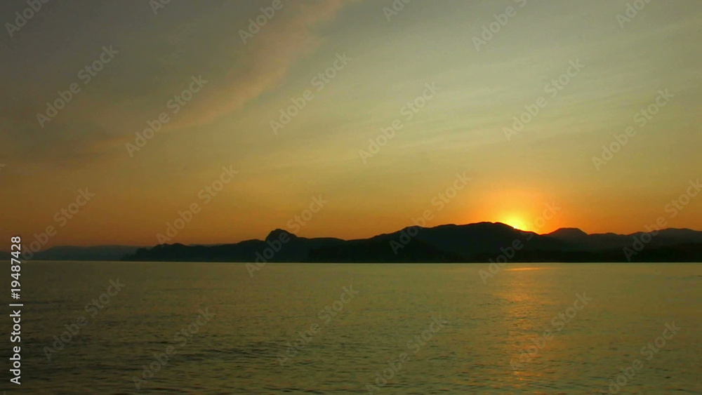 HD sea and rocks at sunset with clouds timelapse HD sea and rocks at sunset with clouds timelapse