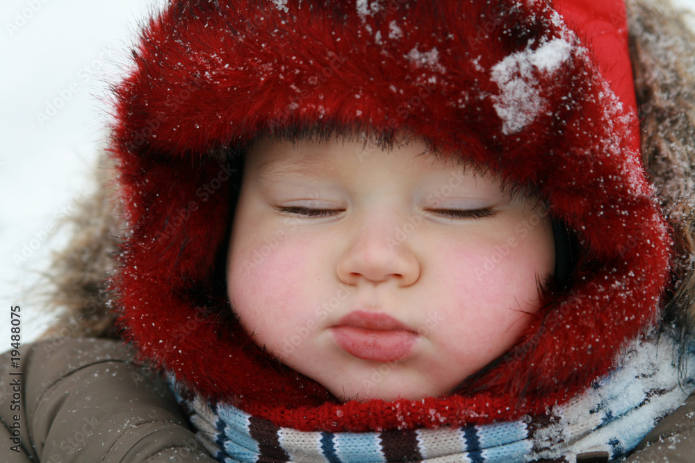 Baby sleeping on winter cold day Baby sleeping on winter cold day