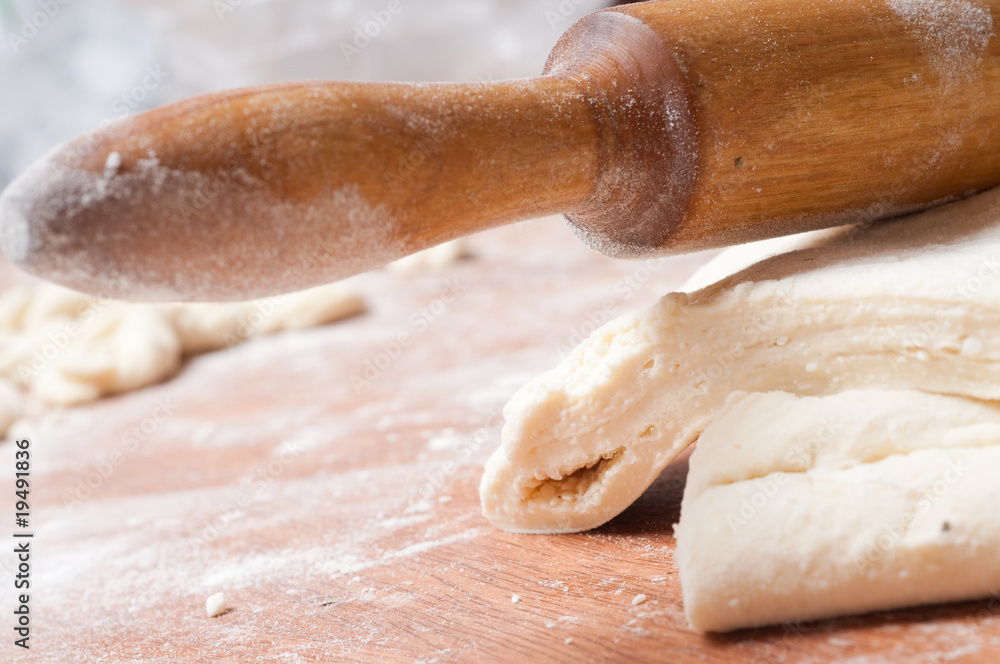 dough on a wooden board dough on a wooden board