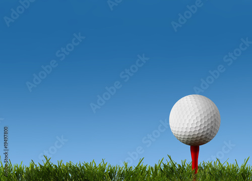 Ball for a golf on a green lawn