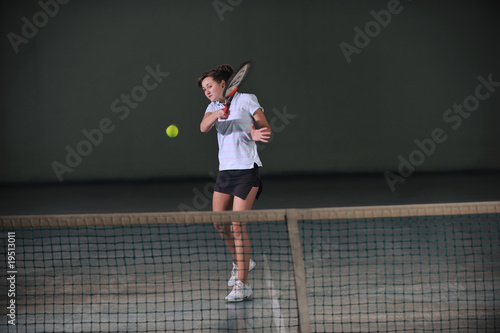one young woman play tennis © .shock