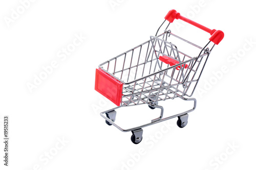 Shopping cart isolated on white background. Shallow DOF