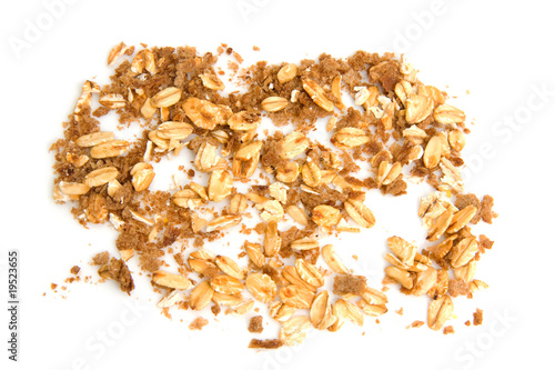 Bread crumbs and flakes over white background
