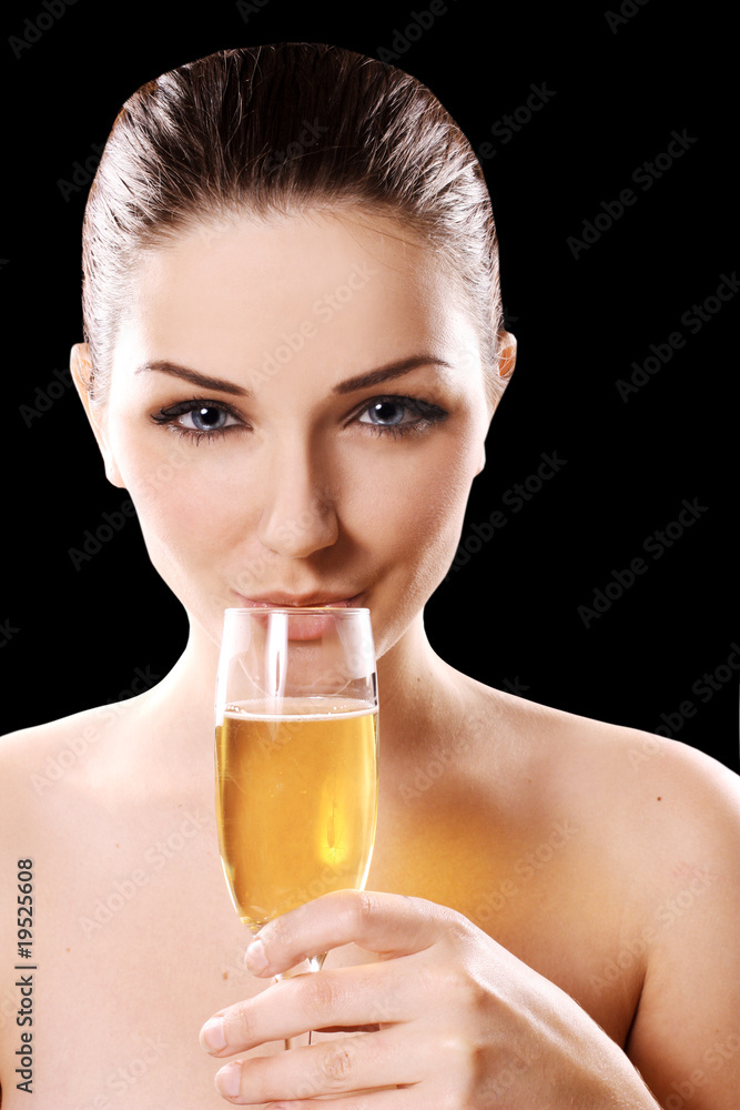 Young woman drinking champagne