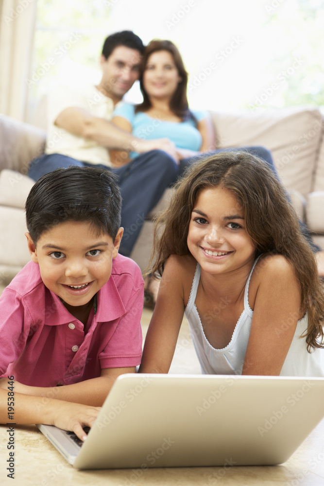Fototapeta premium Children using laptop At Home