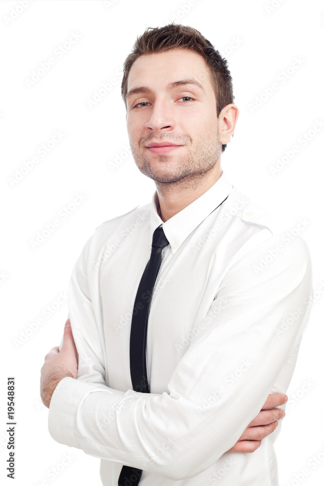 Young Businessman standing with his arms crossed Young Businessman standing with his arms crossed