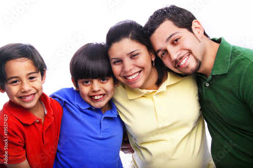 Happy Family Embracing Wearing Varied Color Shirts