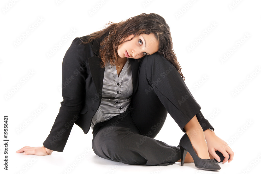 pensive business woman siiting on floor pensive business woman siiting on floor