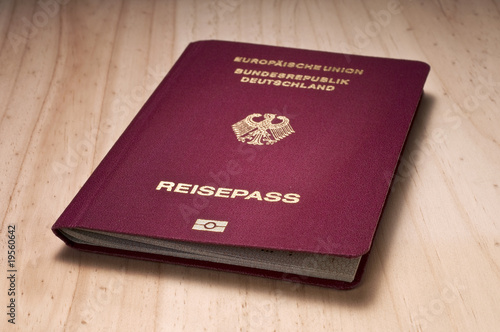 german passport on wooden board
