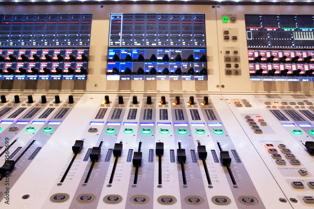 professional audio mixer in a recording studio