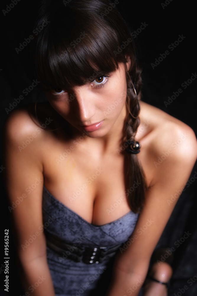 young woman on black background. young woman on black background.