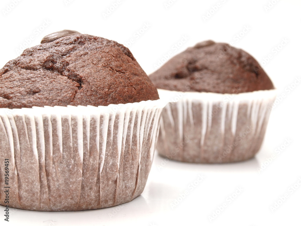 Chocolate muffins on white background Chocolate muffins on white background