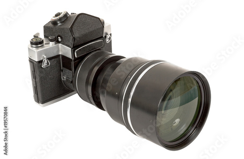 SLR camera and lens on a white background