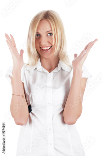 The cheerful charming blonde in a white shirt