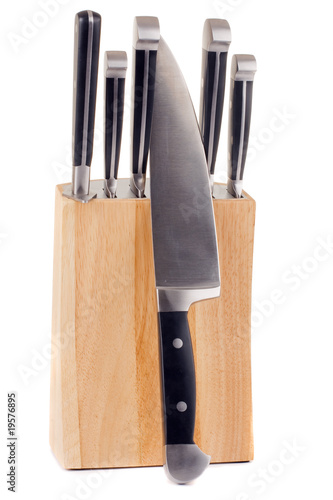 Set of kitchen knifes isolated on white photo