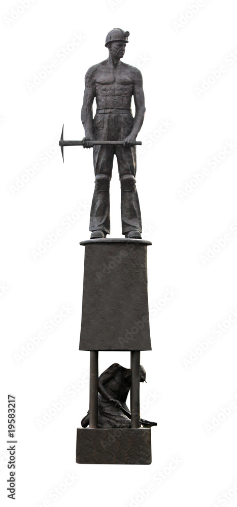 Fototapeta premium A Statue of Two Coal Miners on a Large Oil Lamp.