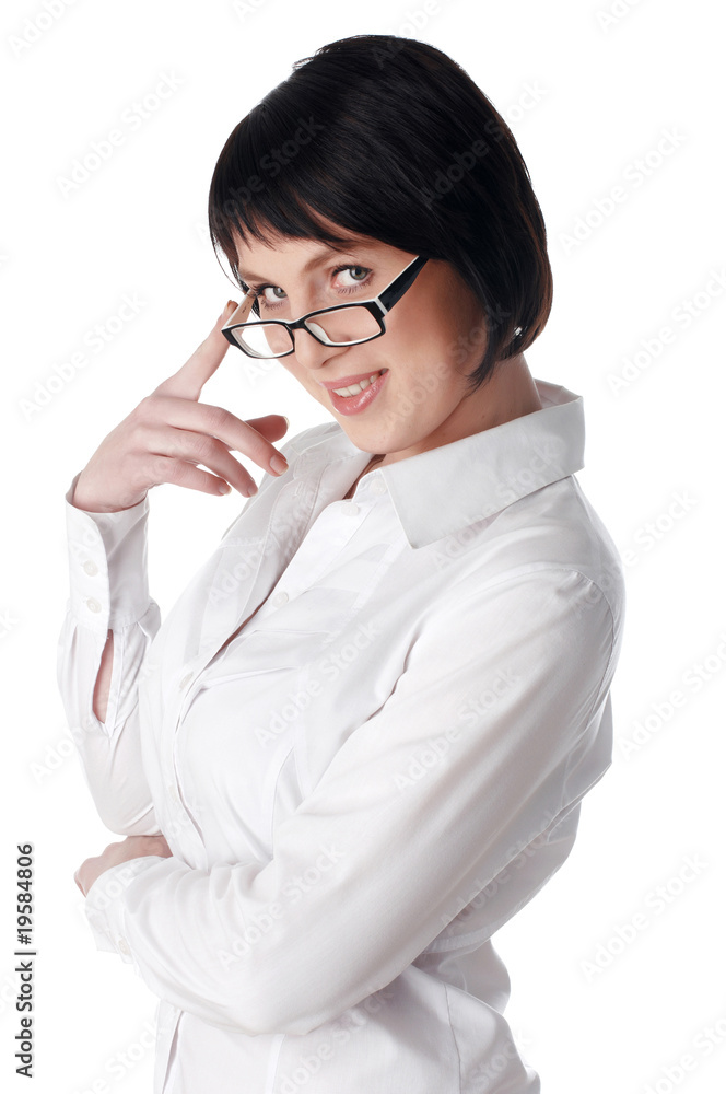 The charming young business woman in a white shirt The charming young business woman in a white shirt
